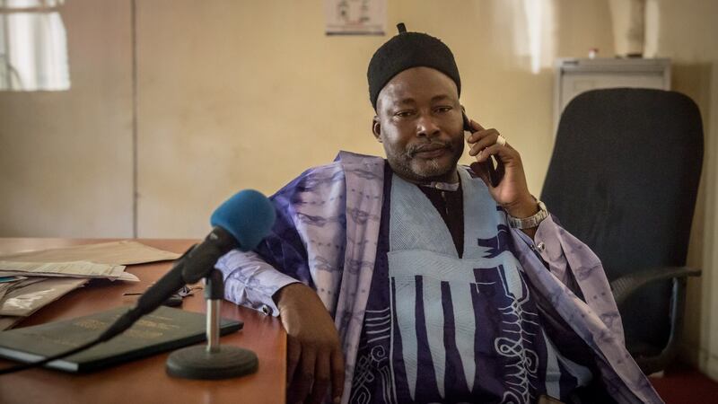 Bello Danbatta in his sparse office in Maiduguri’s disused central post office. He is a spokesman for the Civilian Joint Task Force (CJTF), which chased Boko Haram out of Maiduguri, armed with sticks, nearly a decade ago. Photograph: Sally Hayden
