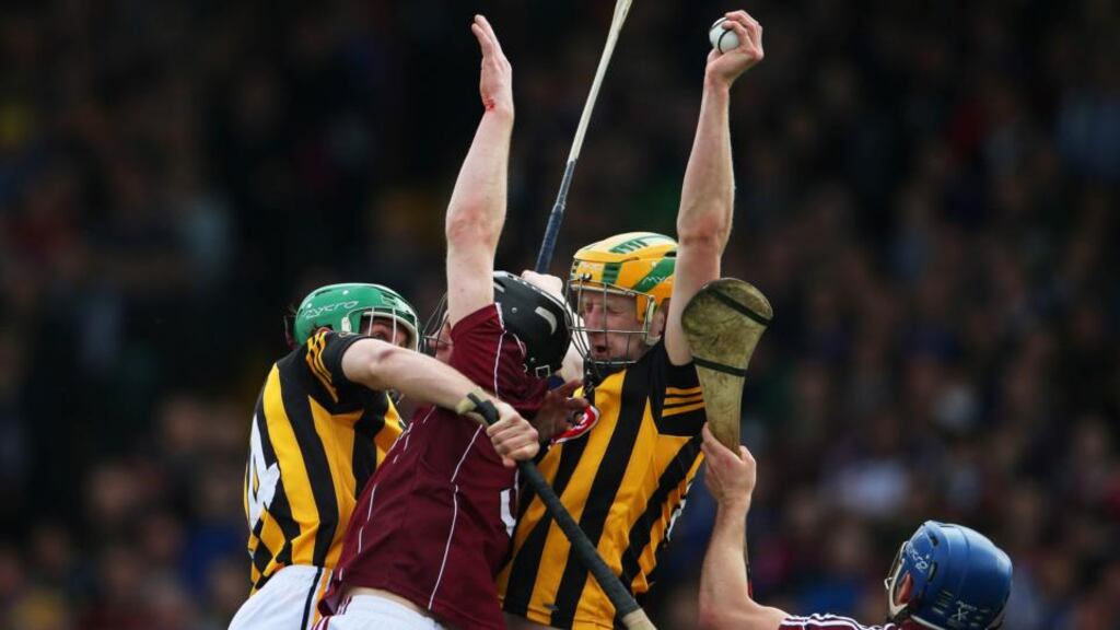 Kilkenny’s John Power catches a high ball over Ronan Burke and Johnny Coen of Galway during the National League semi-final at the Gaelic Grounds, Limerick. Photograph: Cathal Noonan/Inpho