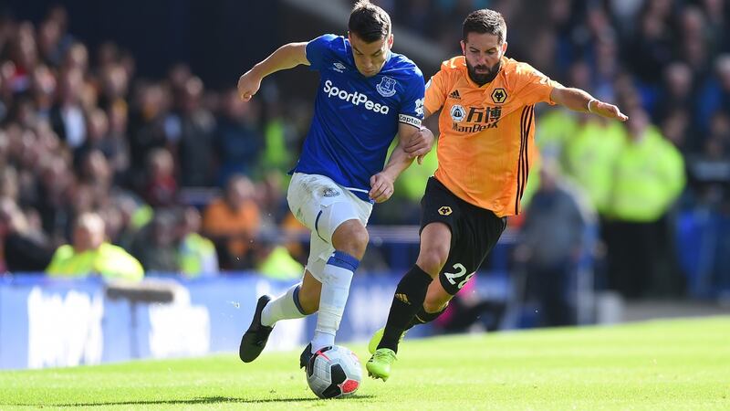 Seamus Coleman is challenged by Joao Moutinho during Everton’s 3-2 win over Wolves. Photograph: Nathan Stirk/Getty