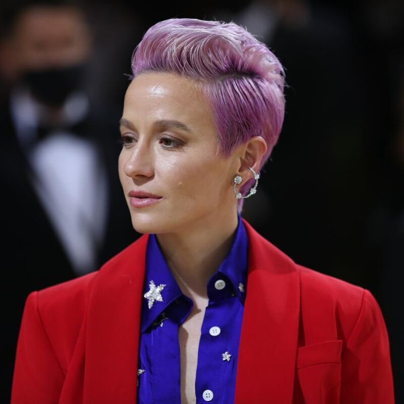 Soccer star Megan Rapinoe wearing a patriotic Sergio Hudson suit and shirt