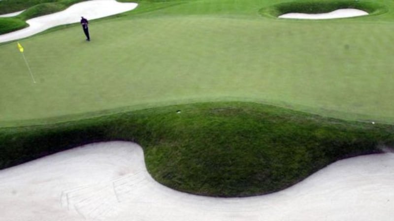 Golf coach agrees to remove PGA references