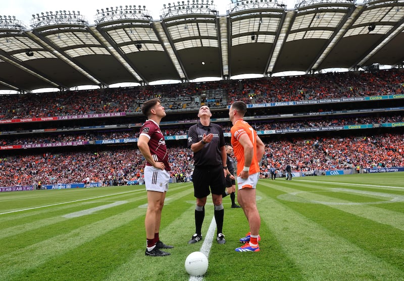 Galway's Sean Kelly, referee Sean Hurson and Armagh's Aidan Forker at the coin toss ahead of last year's All-Ireland final. Photograph: James Crombie/Inpho