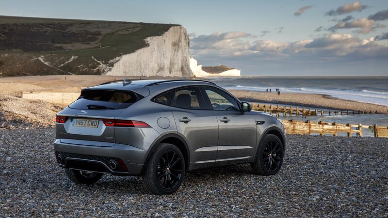 A raked rear window and large, overhanging spoiler take some styling cues from Jaguar’s F-Type sports car