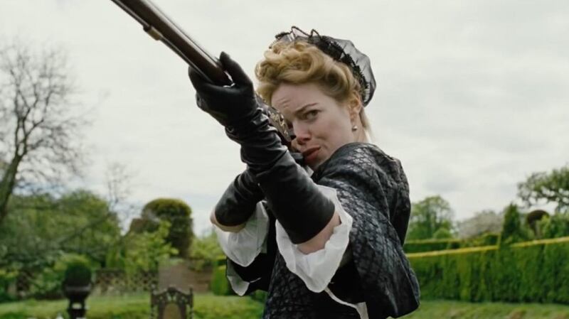 Emma Stone stars along with Rachel Weisz and Olivia Colman in ‘The Favourite’