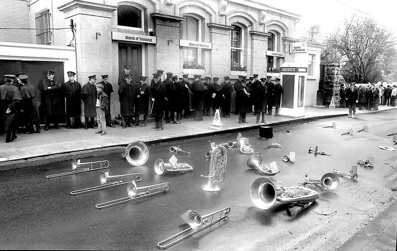 'Band on the run… members of Ballinrobe Brass Band had to abandon their instruments amid a downpour.' Photograph: Henry Wills
