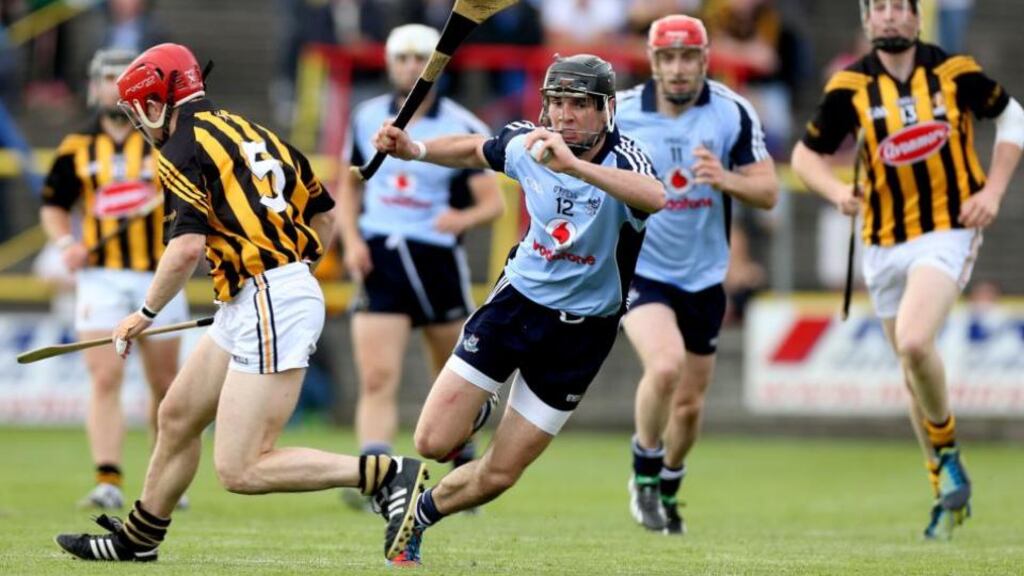 Danny Sutcliffe slips past the challenge of  defender Tommy Walsh to score the goal that made sure of the Dublin hurlers’ historic Leinster championship victory over Kilkenny. Photograph:  James Crombie/Inpho