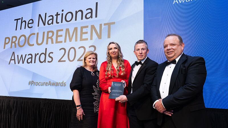 Paul Farrelly, awards judge, presents the best procurement internal collaboration project of the year award to Musgrave team