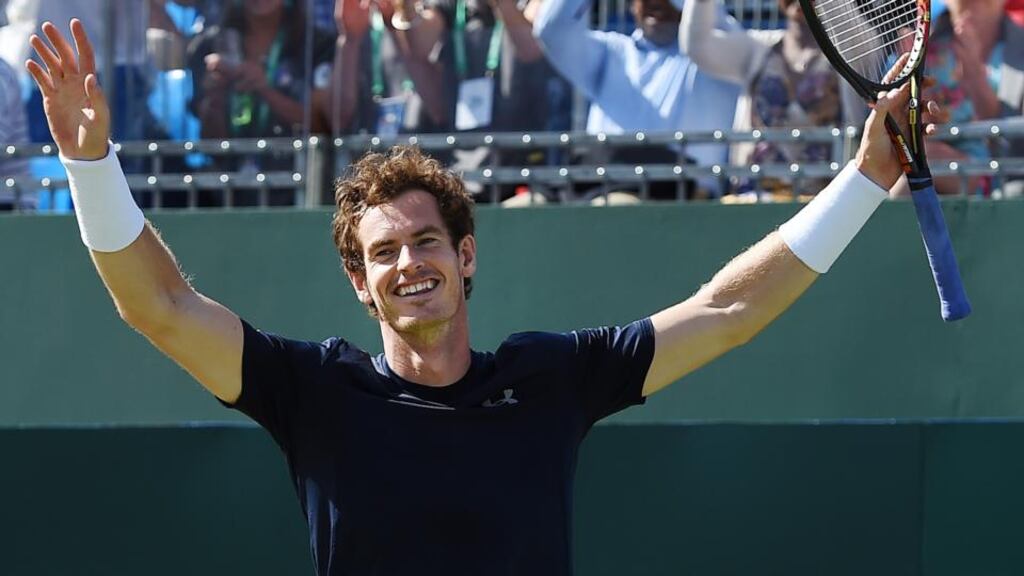 Andy Murray reacts after beating Giles Simon of France during the Davis Cup quarter final match at the Queens Club in London, Britain, 19th July 2015. Photograph: EPA/ANDY RAIN