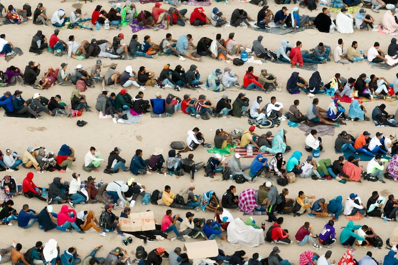 An aerial view of migrants waiting to be processed on the Ciudad Juarez side of the border in El Paso, Texas. Photograph: Brandon Bell/Getty Images