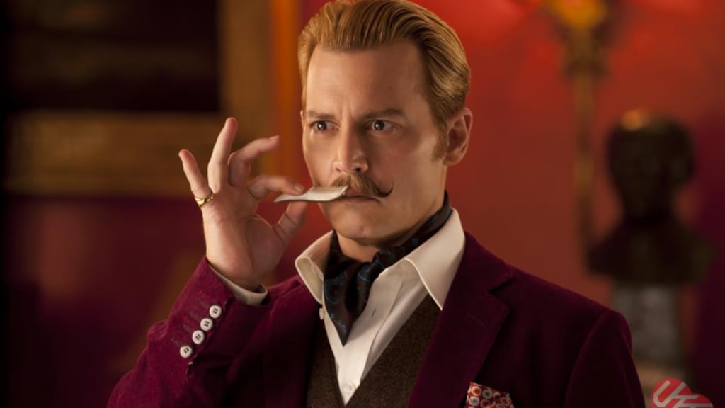 Heart-sinkingly effete: Johnny Depp as Lord Charlie Mortdecai