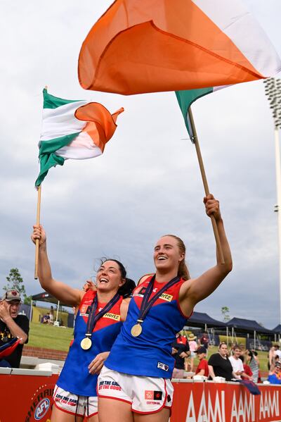Sinéad Goldrick and Blaithin Mackin of the Demons celebrates victory during the AFLW Grand Final match between the Brisbane Lions and the Melbourne Demons at Brighton Homes Arena. Photograph: Matt Roberts/AFL Photos/Getty Images