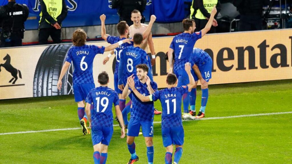 Croatia celebrate Ivan Perisic’s late winner against Spain in Bordeaux. Photograph: Reuters