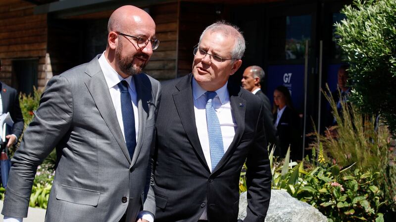 European Council president Charles Michel (left) and Australia’s prime minister Scott Morrison arrive for a plenary session during the G7 summit in Cornwall. Photograph: Phil Noble/PA Wire