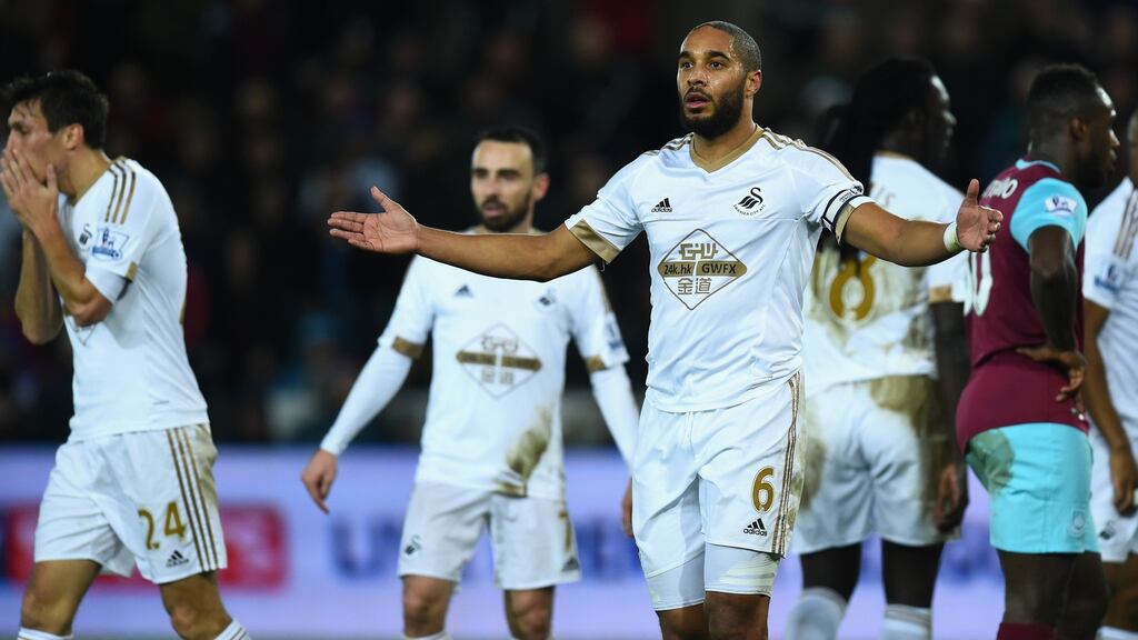 Swansea’s Ashley Williams appeals to the linesman after a penalty appeal is turned down against West Ham United at the Liberty Stadium. Photograph: Stu Forster/Getty Images