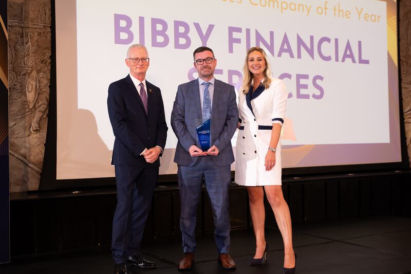 Ian Talbot, chief executive of Chambers Ireland; Mark O'Rourke, managing director at Bibby Financial Services Ireland; and Anna Daly, MC of the awards. Photographer: Ruben Morrissey-Fernandez/Ruby Productions