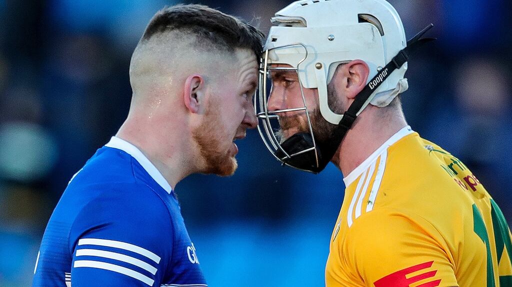 Laois’ Liam O’Connell and Neil McManus of Antrim square off after the Allianz Hurling League Division 1B game at MW Hire O’Moore Park in Portlaoise. Photograph: Evan Treacy/Inpho
