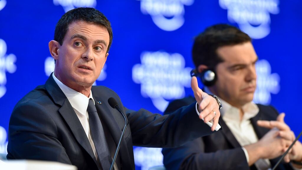 French prime minister Manuel Valls gestures next to Greek prime minister Alexis Tsipras during a Davos session. Photograph: AFP/Getty
