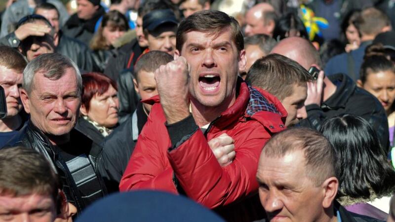 Pro-Russian activists attend a protest rally in the eastern Ukrainian city of Donetsk. Photograph: Stringer/Reuters
