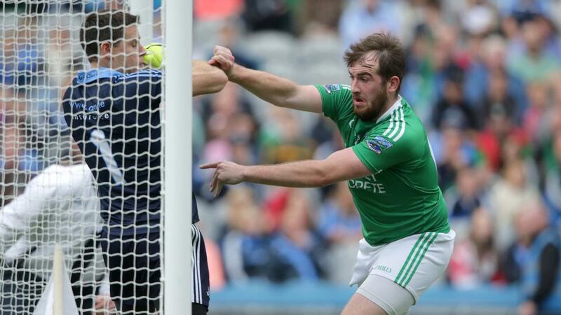 Fermanagh’s Seán Quigley pushes Dublin goalkeeper Stephen Cluxton into the net with the ball, which resulted in a goal being awarded to the Ulster side during the All-Ireland SFC quarter-final at Croke Park. Photograph: Morgan Treacy/Inpho