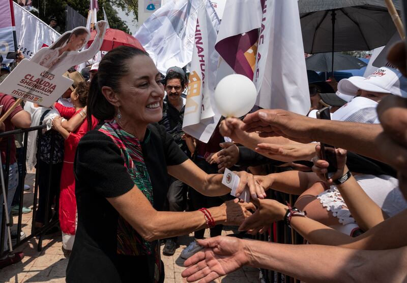 Claudia Sheinbaum greets supporters at a campaign rally in Alvaro Obregon municipality, Mexico City, earlier this month. Photograph: Yuri Cortez/AFP via Getty Images