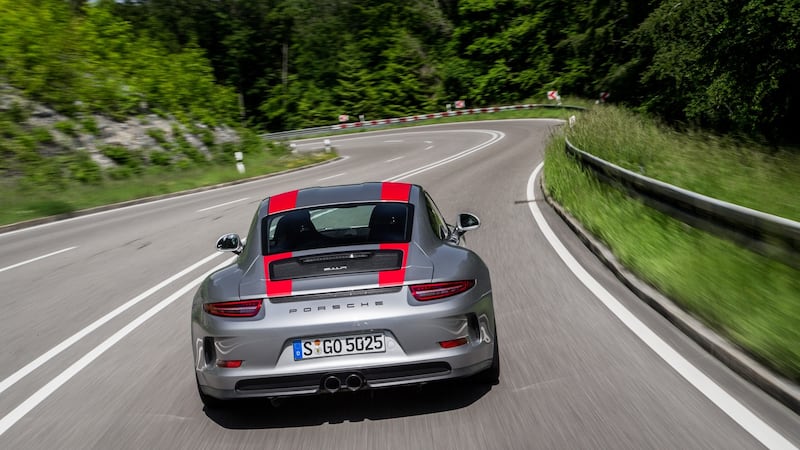 Ripping all that GT3 RS wingery off it robs the 911 R of the track-pack 911’s glued-down feel, especially at high speed.
