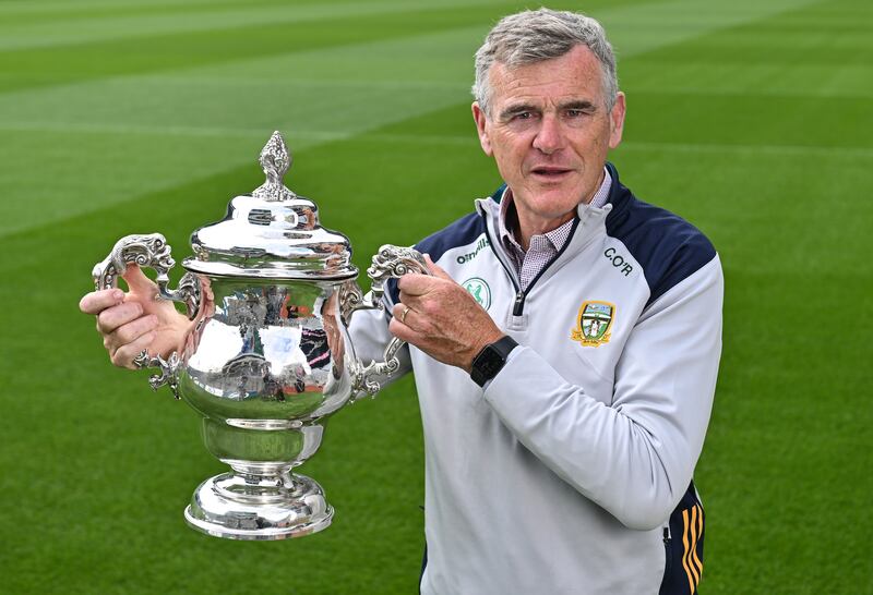 Colm O'Rourke, Meath manager, with the  Tailteann Cup at Croke Park in Dublin. Photograph: Piaras Ó Mídheach/Sportsfile