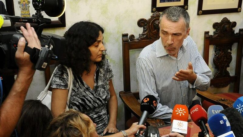 Parents of Ashya King, Brett King and Naghmeh King, speak to the media after their release from prison. Photograph: RAUL CARO/EPA