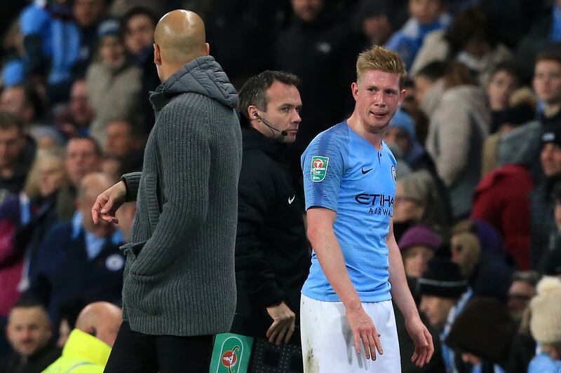 De Bruyne speaks with City’s manager Pep Guardiola (left) as he leaves the field after picking up an injury against Fulham on November 1st. Photograph: Lindsey Parnaby/AFP/Getty