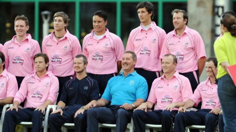 Allen Stanford (blue shirt) poses with the Middlesex team, including Ed Joyce (front row, second from left) and Eoin Morgan (back row, far left). Photograph: Jewel Samad/Getty Images
