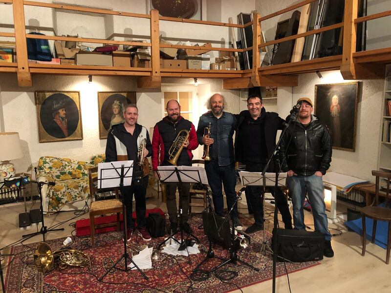 Members of the brass section, from left, Gavin Barr, Christian Eccli and Giovanni Dalfovo, along with Donegal musician Martin Tourish and engineer Giacommo Plotegher during recording of Snow on the River