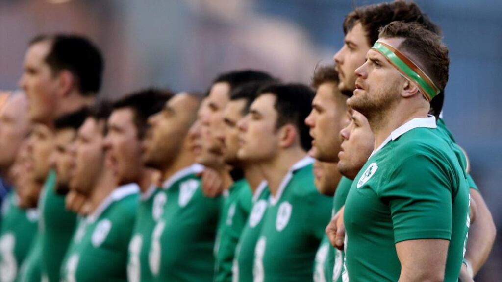 Ireland’s Jamie Heaslip stands for the National Anthem against France. He was substituted after 60 minutes with a back injury. Photograph: James Crombie/ Inpho