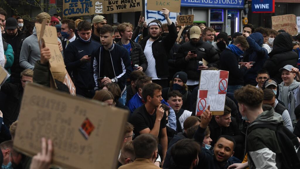 Chelsea fans stage a protest against the European Super League in 2021 Photo: Neil Hall/EPA