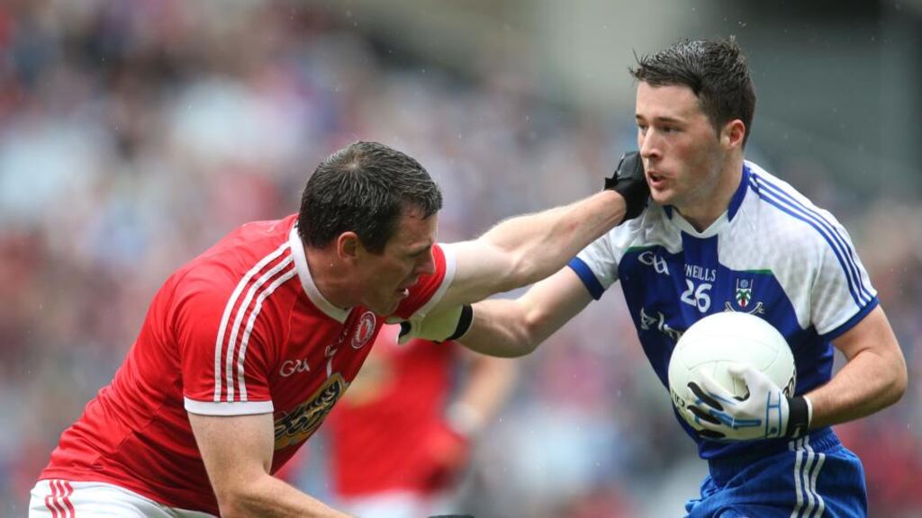 Conor Gormley, seen here challenging Christopher McGuiness during the quarter-final, is set to miss the semi-final against Mayo through suspension