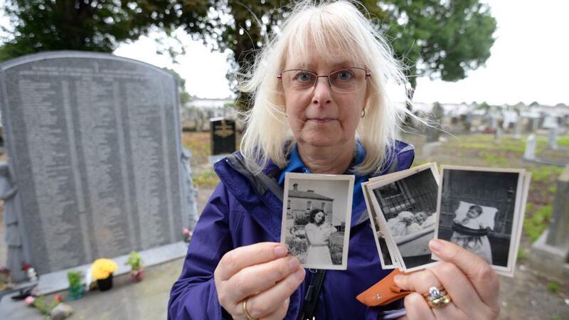 Joyce McSharry holding photographs of herself as a baby with her mother Emily Sheppy at the Bethany Home in 1951, where she spent the first six and a half months of her life before she was adopted. Joyce was attending an annual remembrance at Mount Jerome cemetery for children who lost their lives at the home. Photograph: Alan Betson/The Irish Times