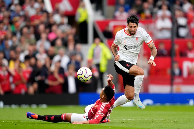Liverpool's Dominik Szoboszlai battles for possession of the ball with Manchester United's Casemiro. Photograph: Nick Potts/PA Wire