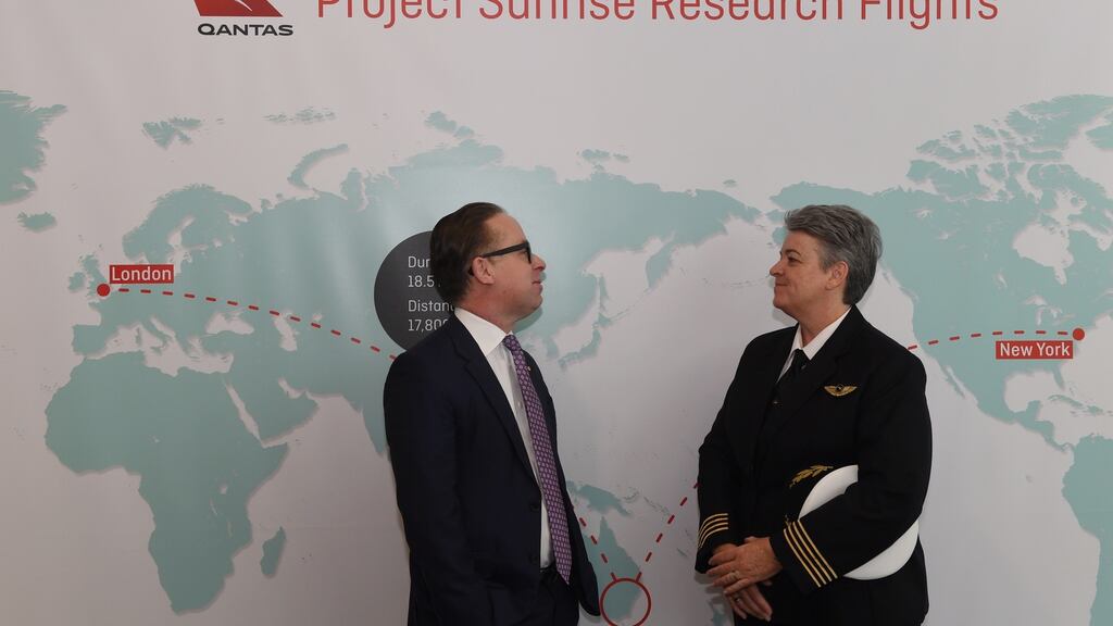 Qantas group CEO Alan Joyce (L) joins Fleet Manager B787-9, Capt Lisa Norman (R) in front of the Project Sunrise background. Photograph: Dean Lewins/EPA