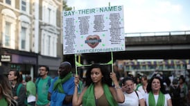 Silent procession marks first anniversary of Grenfell Tower blaze which claimed lives of 72 people