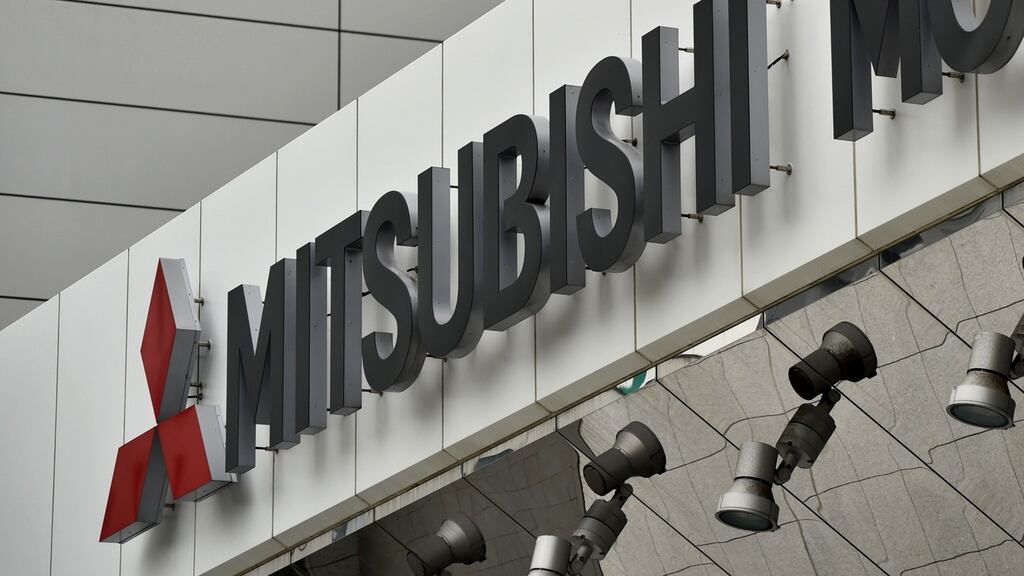 Mitsubishi Motors has forecast it will swing to an annual net loss for the first time in eight years, hit by fallout from the revelation it falsified fuel economy data for its vehicles sold in Japan over the past decade.