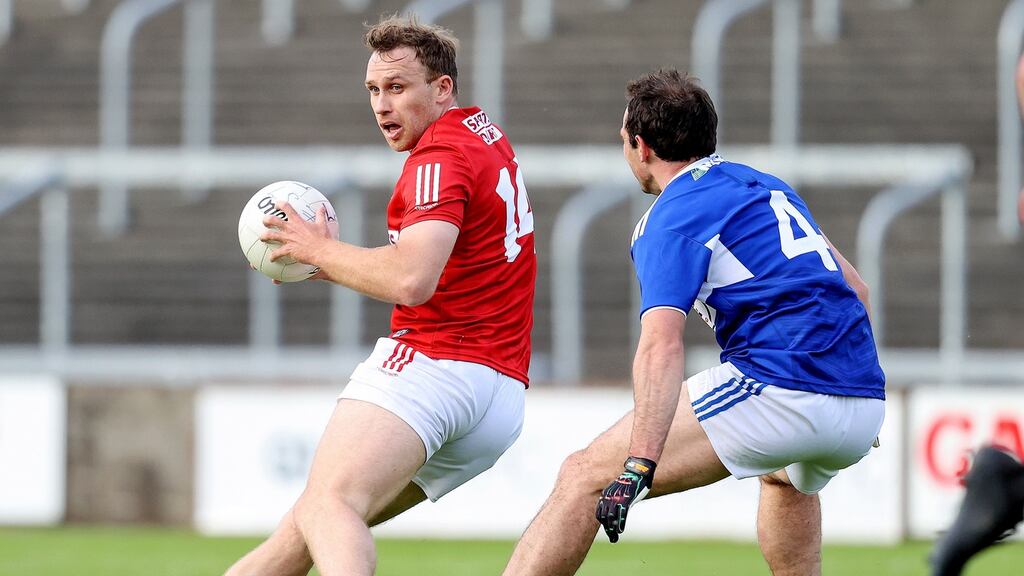 Cork’s Ciarán Sheehan tries to shake off  Gareth Dillon of Laois during the Allianz Football League Division 2 South match at  MW Hire O’Moore Park. Photograph: Bryan Keane/Inpho