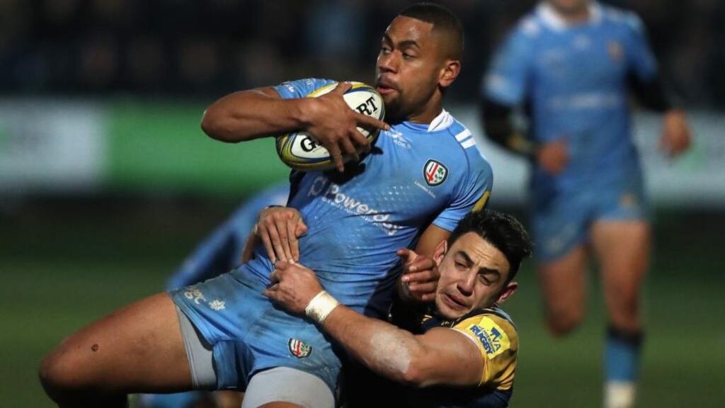Joe Cokanasiga of London Irish is tackled by Bryce Heem during the Aviva Premiership match against Worcester Warriors at Sixways Stadium. Photograph: David Rogers/Getty Images