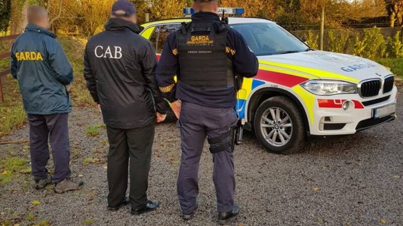 More than 80 gardaí and Criminal Assets Bureau officers searched properties on Tuesday linked to a gang suspected of involvement in rural crime.