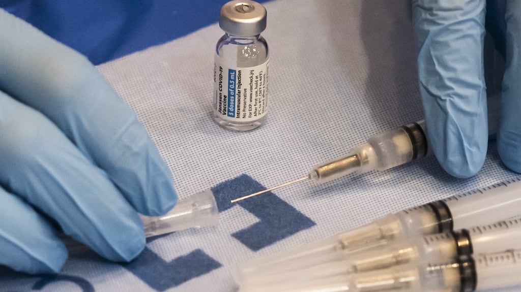 A healthcare worker prepares a dose of the Johnson & Johnson Janssen Covid-19 vaccine at the Atlantic County vaccination megasite in Atlantic City, New Jersey. File photograph: Mark Kauzlarich/Bloomberg