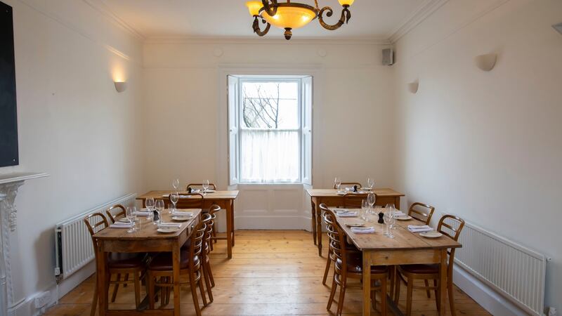 There are two plainly decorated dining rooms, all set to welcome the couple’s first guests next Wednesday. Photograph: Patrick Browne