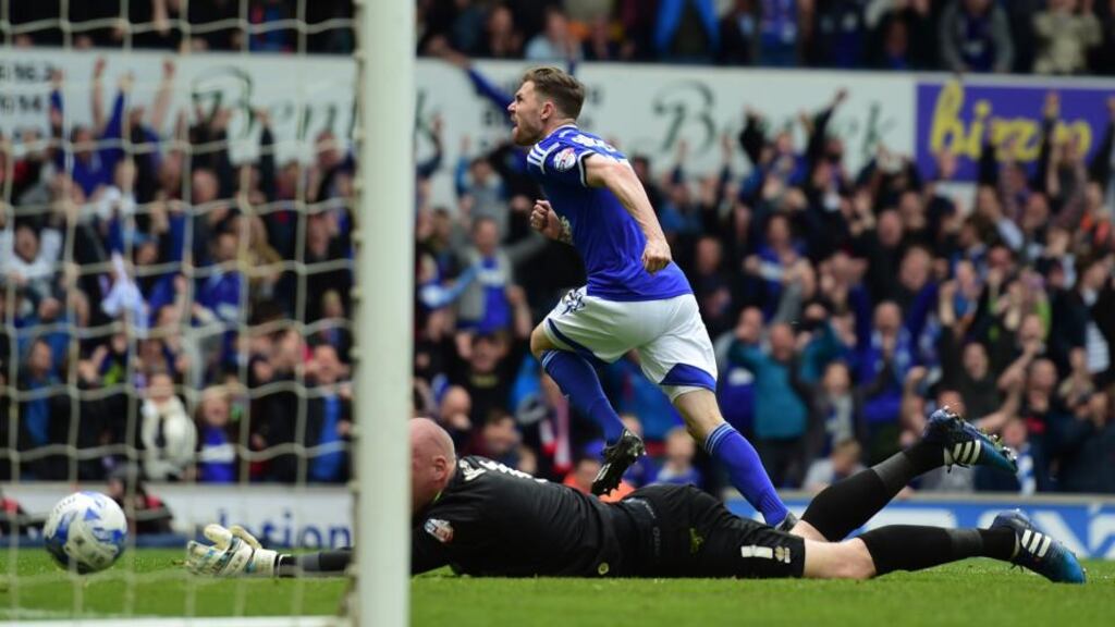 Paul Anderson wheels away after scoring Ipswich’s equaliser against Norwich in the first leg of their Championship play-off final at Portman Road. Photograph: Getty