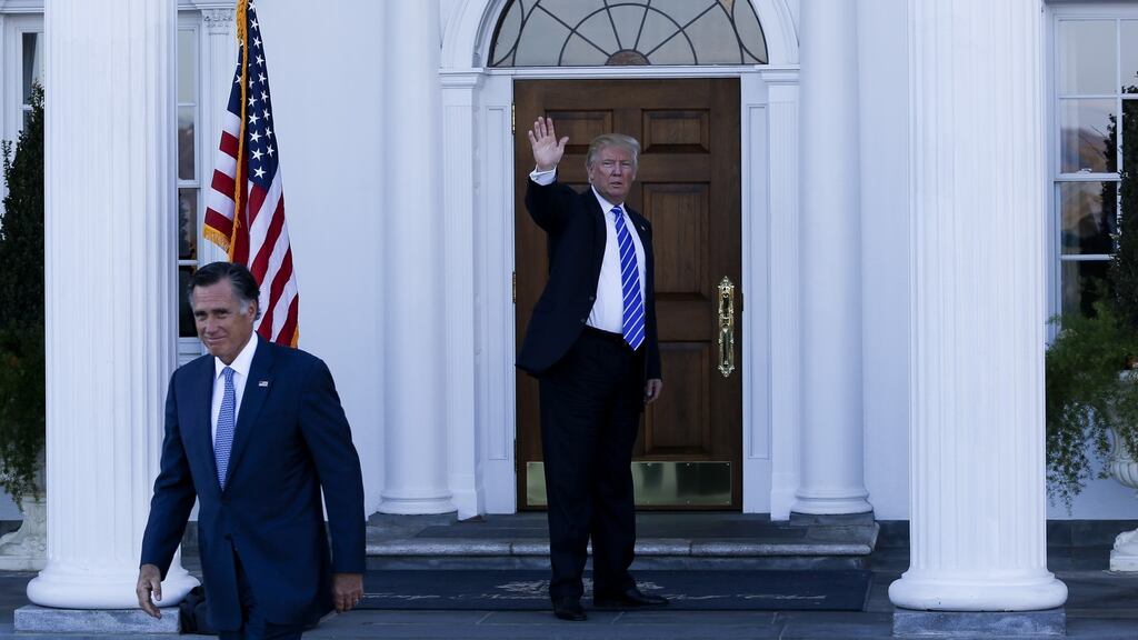 US president-elect Donald Trump waves as Mitt Romney leaves after a meeting at Trump National Golf Club in  New Jersey on November 19th. Trump’s advisers are divided over whether he should make Romney his secretary of state.  Photograph: Aude Guerrucci/Bloomberg