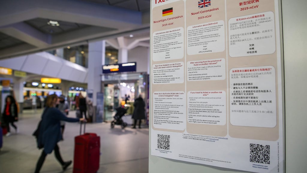 Information in German, English and Chinese about the Coronavirus at Tegel airport in Berlin. Photograph: Andreas Gora/DPA/AFP