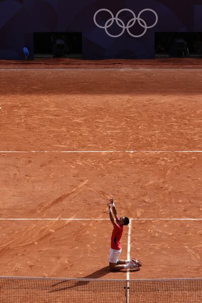 Olympic gold: Serbia's Novak Djokovic reacts to beating Spain's Carlos Alcaraz in their men's singles final tennis match on Court Philippe-Chatrier at the Roland-Garros Stadium during the Paris 2024 Olympic Games on Sunday. Photograph: Thibaud Moritz/AFP/Getty
