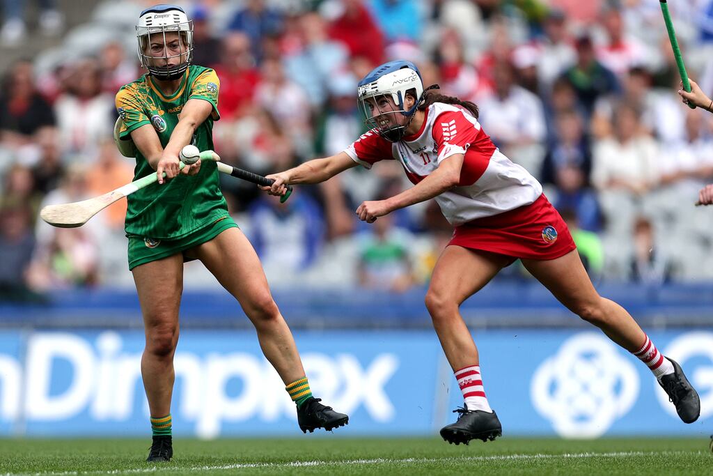 Meath's Tracy King is challenged by Áine McAllister of Derry during the 2023 Glen Dimplex All-Ireland Intermediate Camogie Championship Final at Croke Park. Photograph: Laszlo Geczo/Inpho