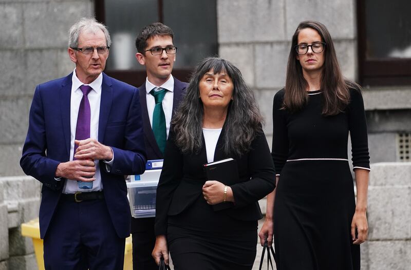 Enoch Burke's father Sean (left) and mother Martina (second right) along with his brother Isaac (second left) and sister Ammi (right) leaving the High Court, Dublin, on Wednesday. Picture: Brian Lawless, PA