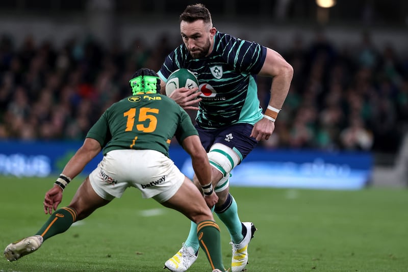 Jack Conan takes on Cheslin Kolbe of South Africa late in the clash at the Aviva Stadium. Photograph: Morgan Treacy/Inpho